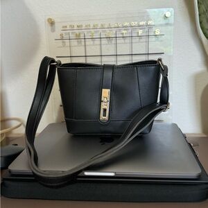 Used black sling bag